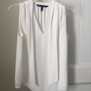 Perfect  blouse for work or evening out with the silver beading accent.